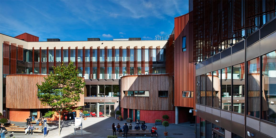 Cambridge campus courtyard with a Blue sky above 
