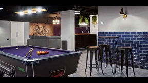 A pool table and breakfast bar in Cambridge's CB1 accommodation