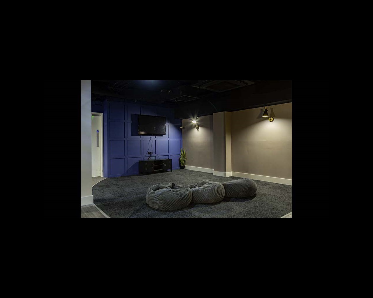 Beanbags in front of a TV, in Cambridge's CB1 accommodation