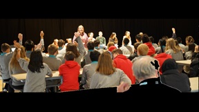 Heather Lilley and students on stage taking questions from audience