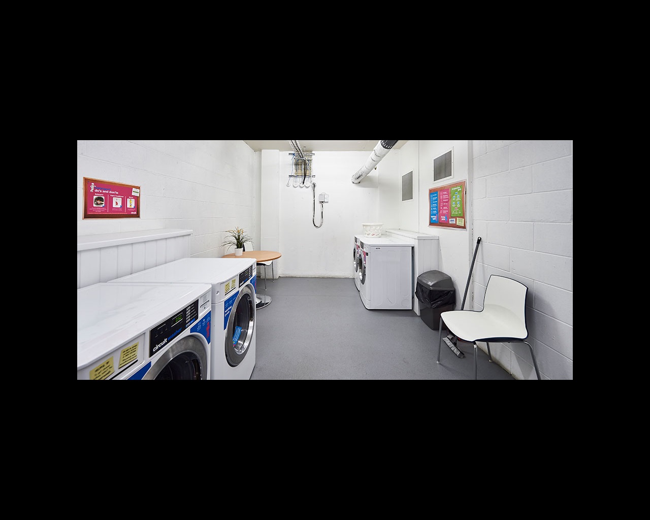Laundry room with four washing machines