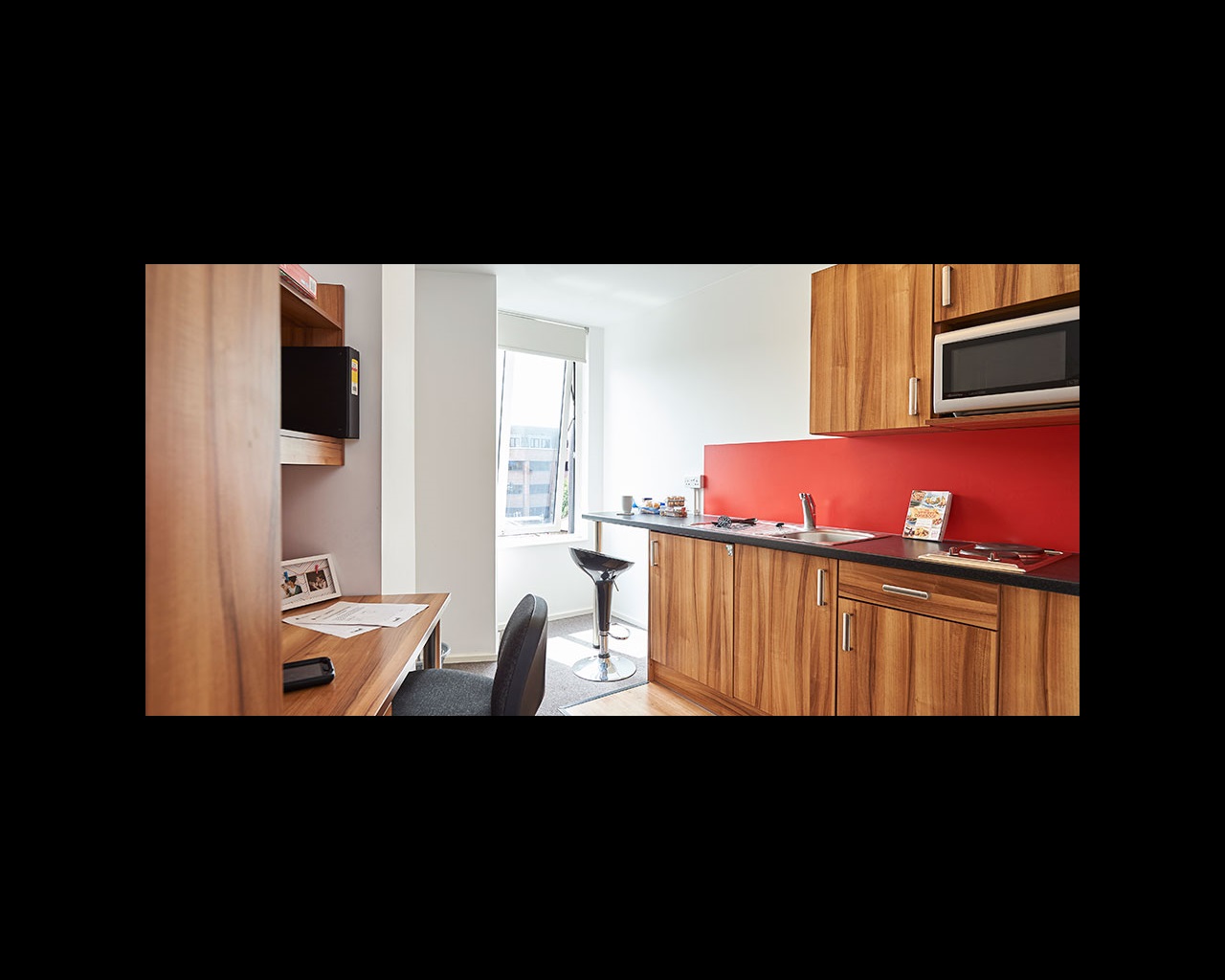 Kitchenette area in a studio apartment