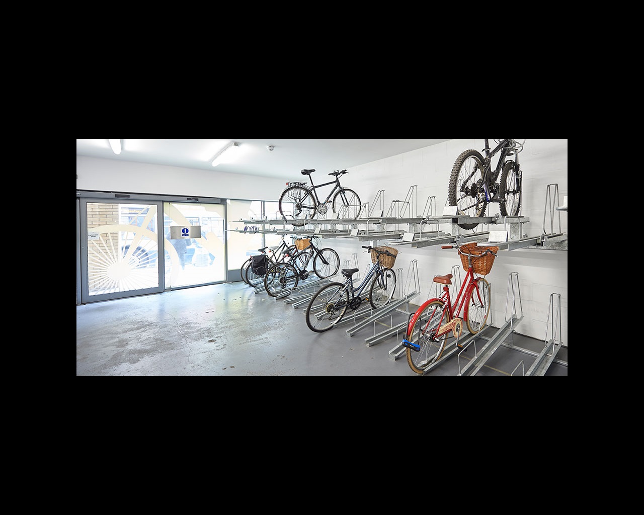Bicycles stored in an inside bike rack