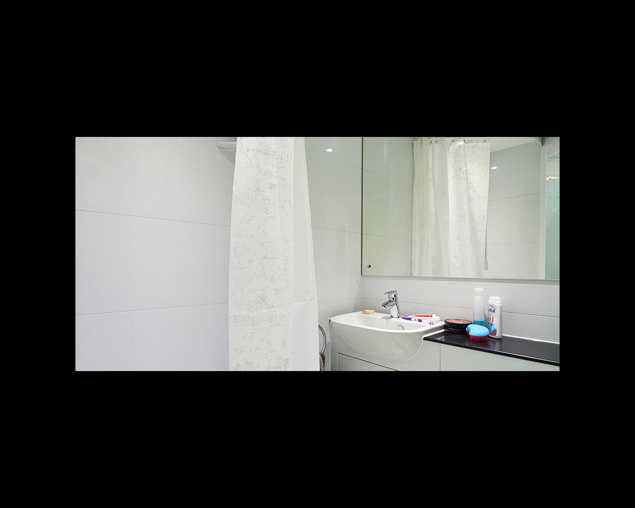 Basin and shower in a bathroom